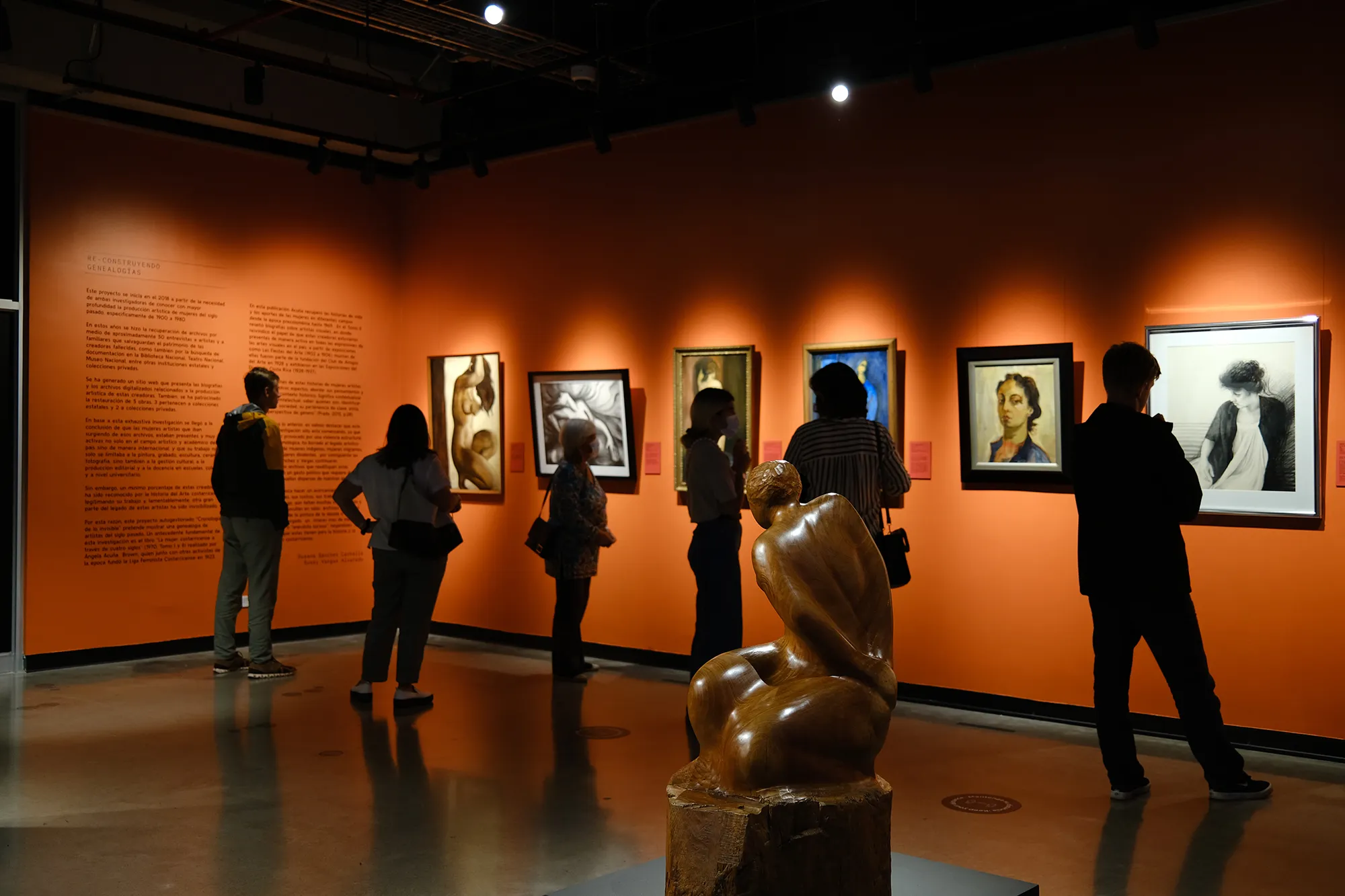 Visitors looking at art pieces in ACT Event 2022